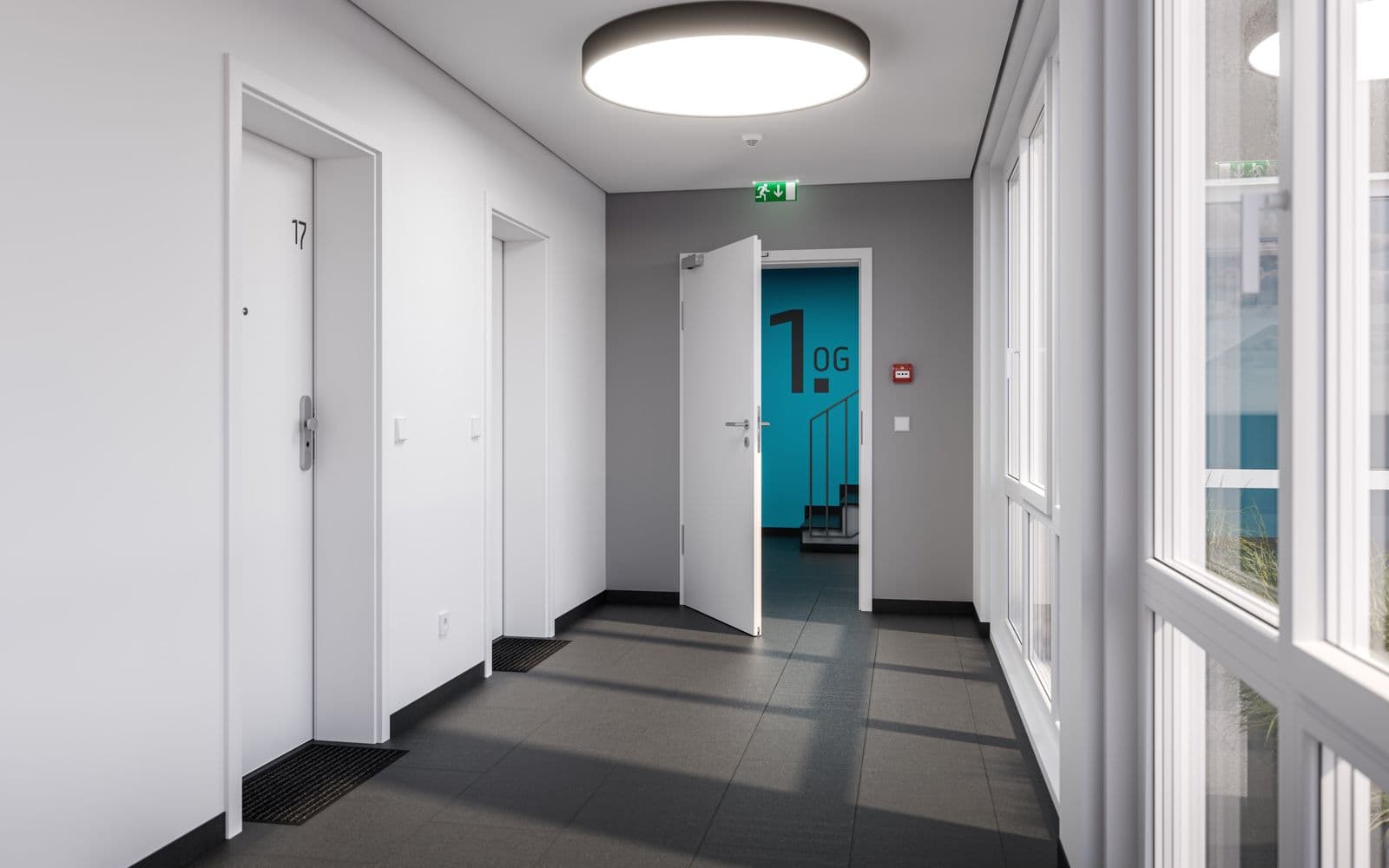 Couloir d’immeuble résidentiel avec portes d’appartement