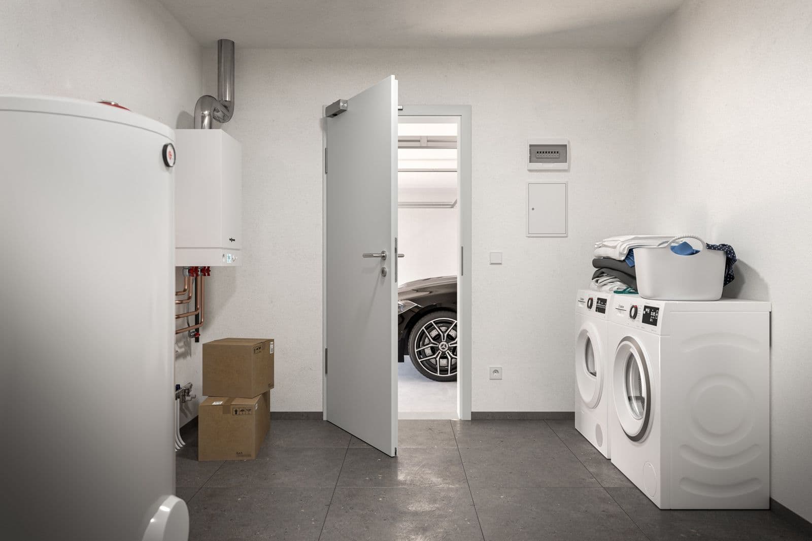 Buanderie donnant sur le garage par une porte intérieure isolante